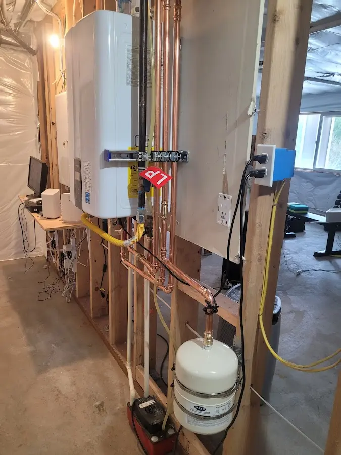 Licensed plumber repairing a kitchen sink in Meraux